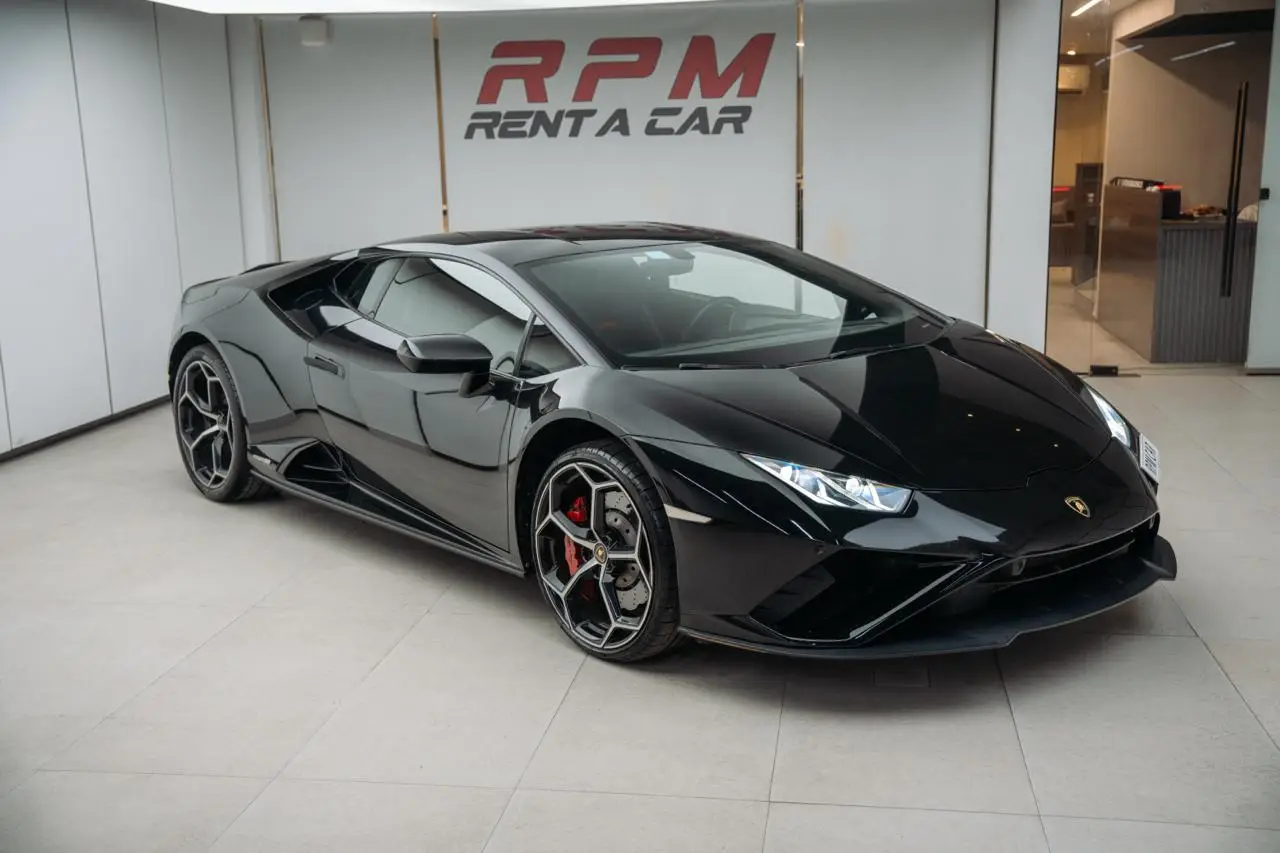 Rent a 2023 Lamborghini Huracan EVO Black in Dubai rental in Al Quoz 3, Dubai