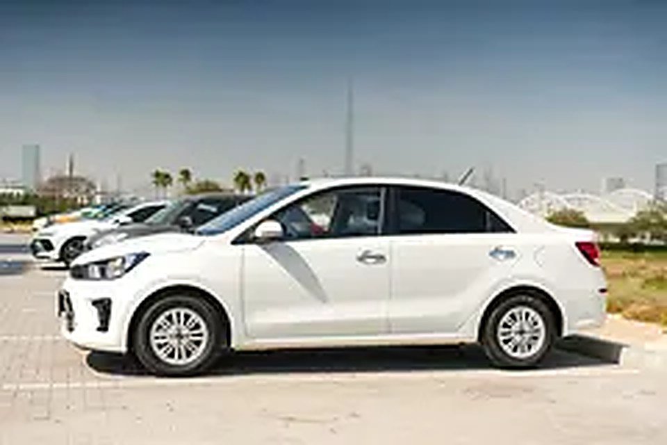 2026 Kia Pegas for Rent in Business Bay photo 2