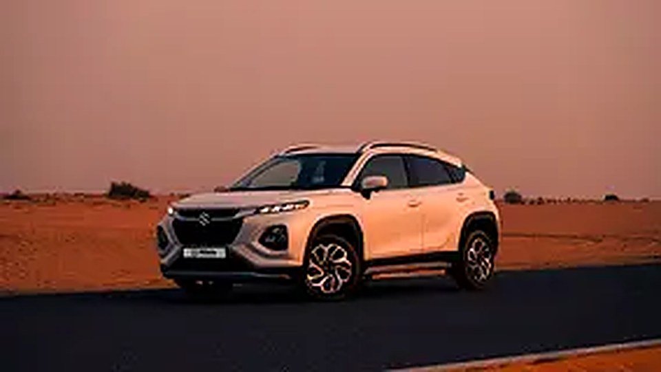 2025 Suzuki Fronx for Rent in Ras Al Khor Industrial 3 photo 2