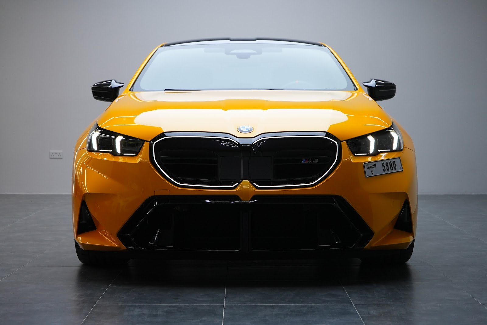 Rent BMW M5 G90 in Dubai (Yellow) rental in Dubai