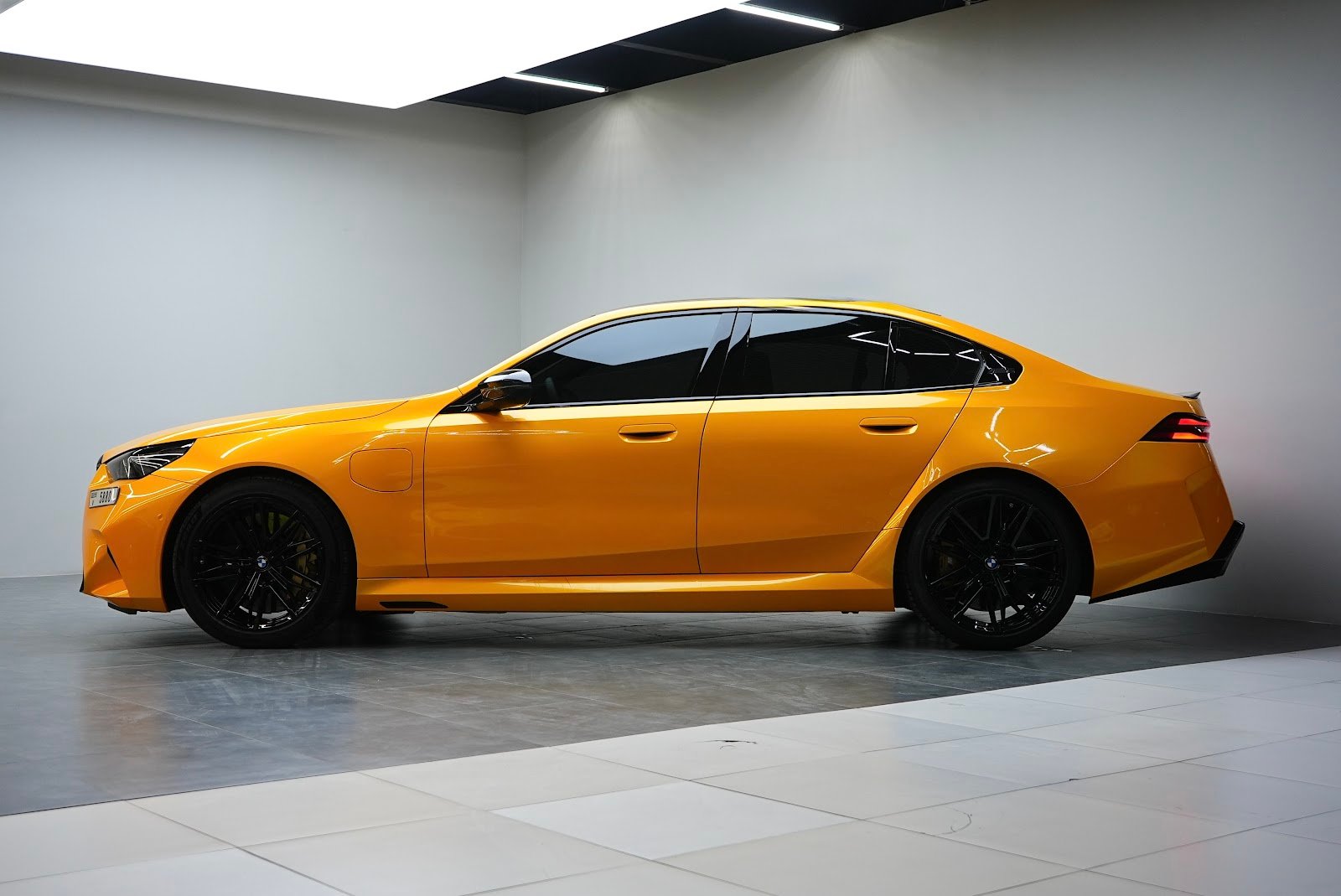 Rent BMW M5 G90 in Dubai (Yellow) photo 14