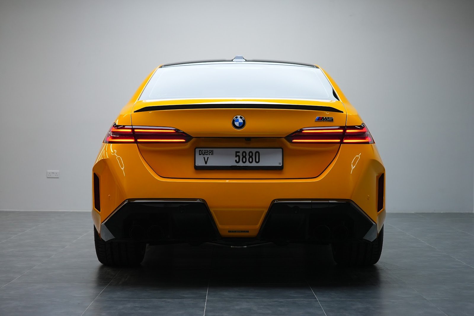 Rent BMW M5 G90 in Dubai (Yellow) photo 2