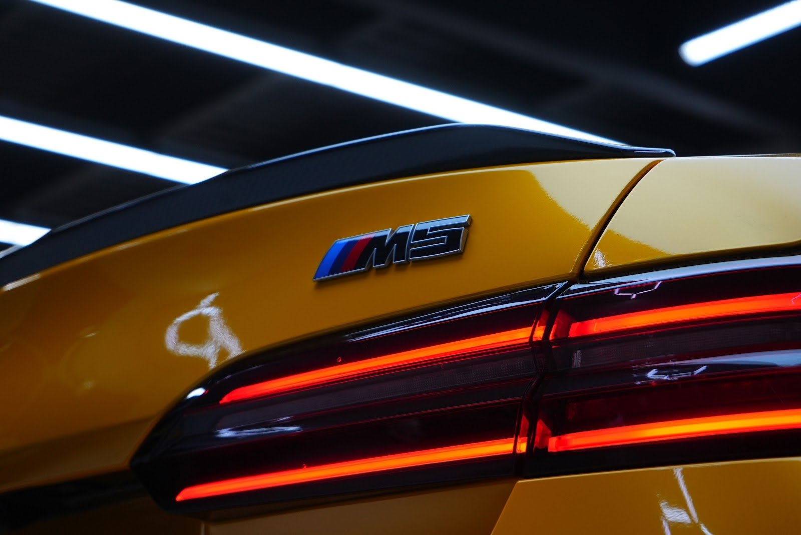 Rent BMW M5 G90 in Dubai (Yellow) photo 4
