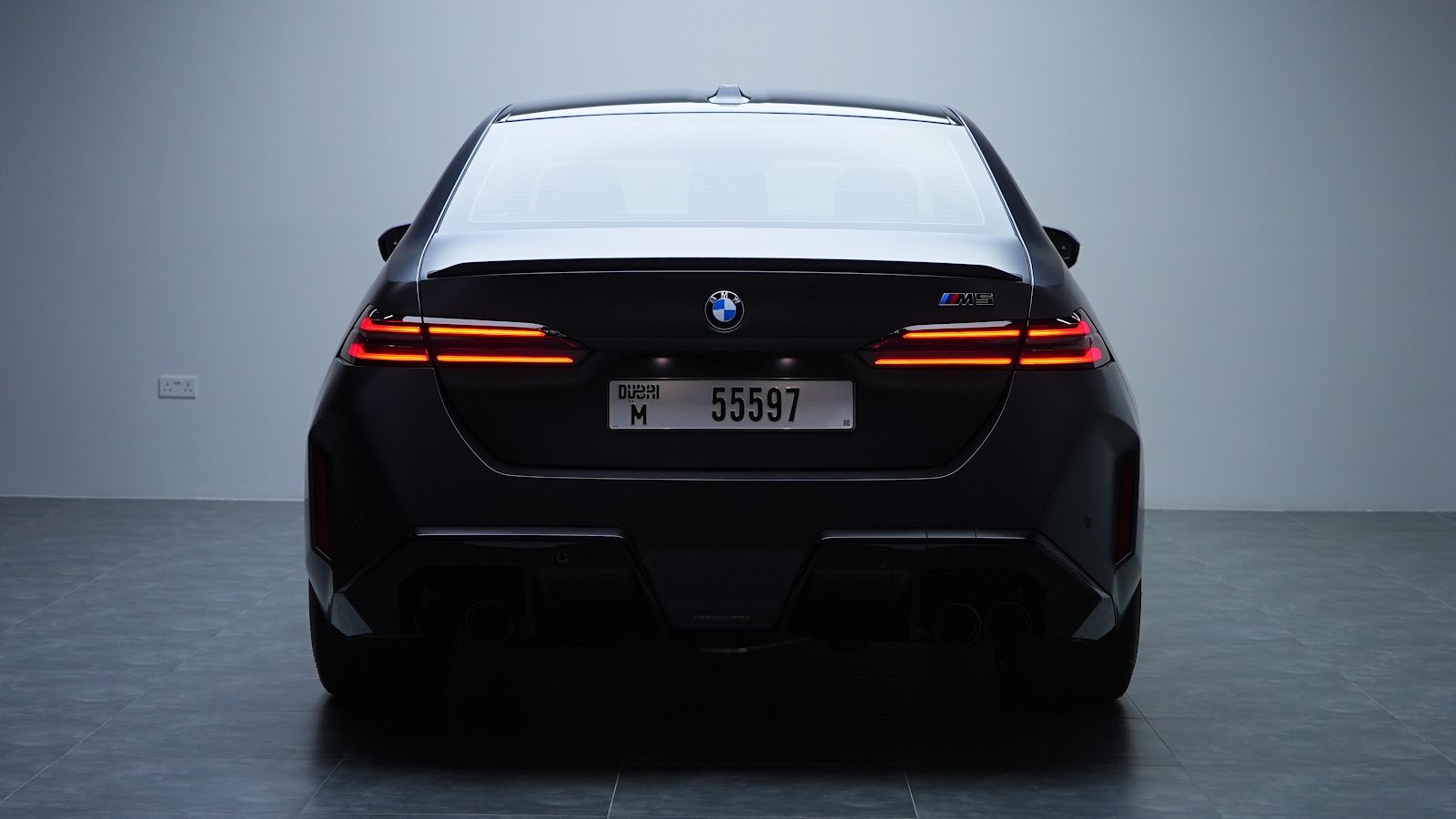 Rent BMW M5 G90 in Dubai (Black Matte) photo 2