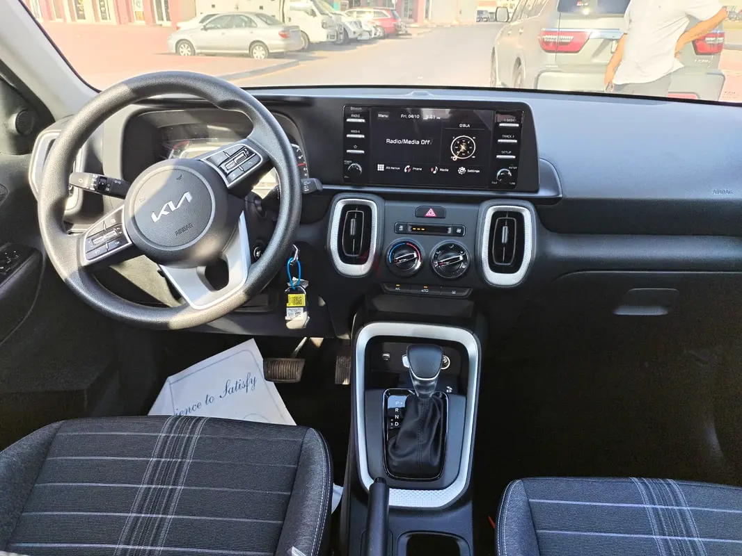 Rent a 2024 Kia Sonet in International City photo 6