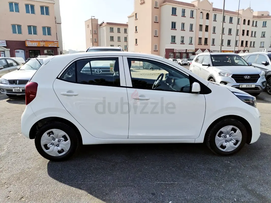Rent a 2023 Kia Picanto in International City photo 2