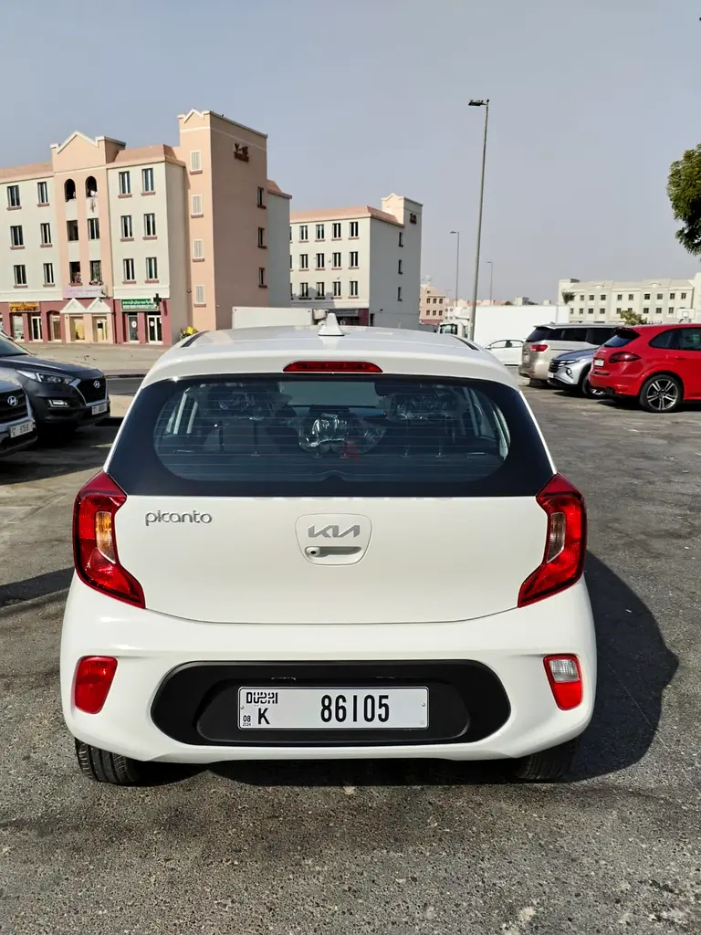 Rent a 2023 Kia Picanto in International City photo 3
