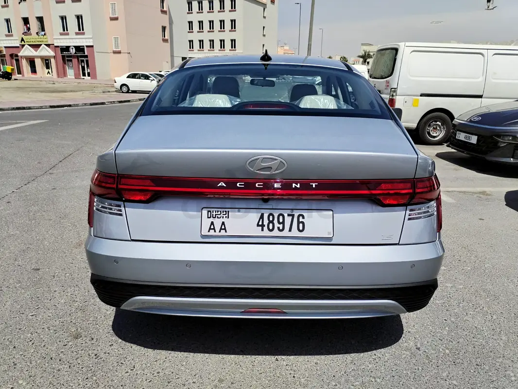 Rent 2024 Hyundai Accent in International City photo 2