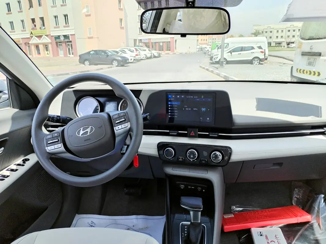 Rent 2024 Hyundai Accent in International City photo 3