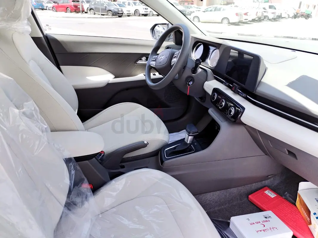 Rent 2024 Hyundai Accent in International City photo 5