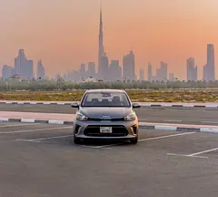 2023 Kia Pegas for Rent in Al Garhoud photo 2