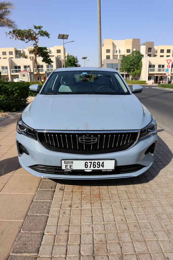 Rent a 2026 Geely Emgrand in International City photo 2