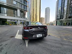 Rent 2025 Mazda 3 in Jumeirah Lake Towers (JLT) | Insured Self-Drive Rental photo 2