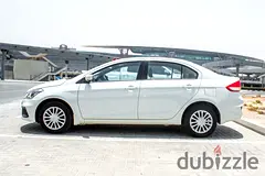 Rent 2024 Suzuki Ciaz in Downtown Dubai — Rent Online with Drivaza photo 7