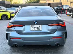 Rent a 2021 BMW 4-Series in Nad Al Sheba 3 photo 4