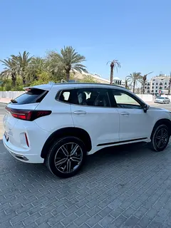 Hire 2025 Exeed LX in Al Karama photo 2