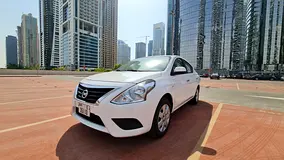 2024 Nissan Sunny Rental in Jumeirah Lake Towers (JLT) | Insured Self-Drive Rental