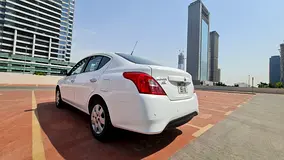 2024 Nissan Sunny Rental in Jumeirah Lake Towers (JLT) | Insured Self-Drive Rental photo 3