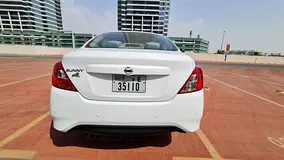 2024 Nissan Sunny Rental in Jumeirah Lake Towers (JLT) | Insured Self-Drive Rental photo 4
